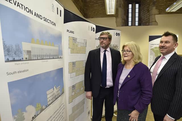 Mayor James Palmer, Peterborough City Council cabinet member for the university Cllr Lynne Ayres and John Hill, combined authority joint chief executive at the exhibition at Peterborough Cathedral