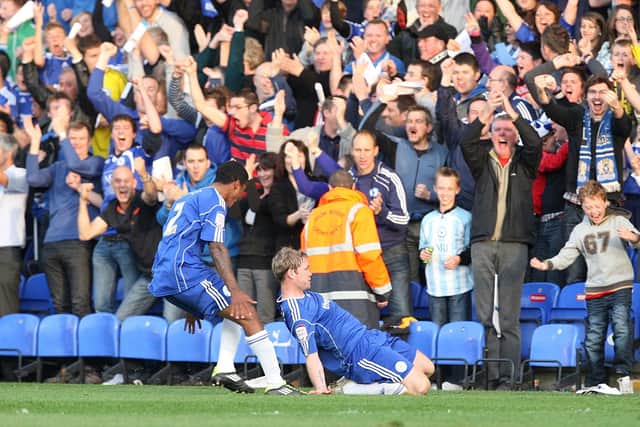 Grant McCann celebrates a goal for Posh against MK Dons in a League One semi-final at London Road in May, 2011.