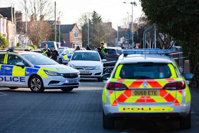 The emergency services at the scene of the stabbing in Dogsthorpe Road. Photo: Terry Harris