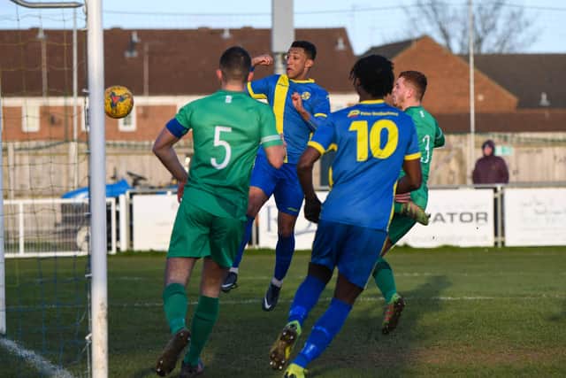 Dion Sembie-Ferris scores for Peterborough Sports against Alvechurch. Photo: James Richardson.