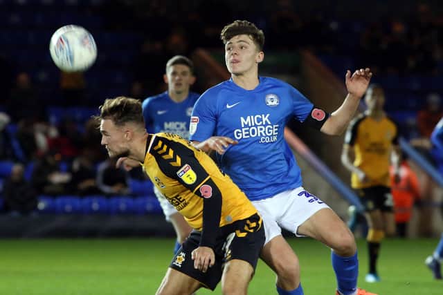 Harrison Burrows (right) in action for Posh.
