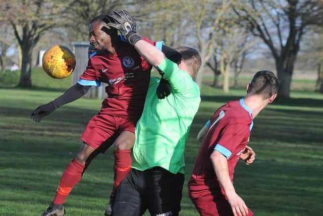Action from Crowland Resv Thorpe Wood Rangers (maroon) at Snowdens Field. Photo: David Lowndes.