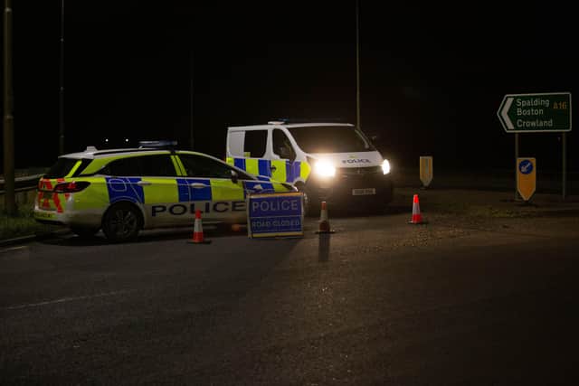 Police at the scene of the fatal collision on the A16