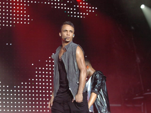 JLS with Aston Merrygold are pictured preforming on the embankment in Peterborough