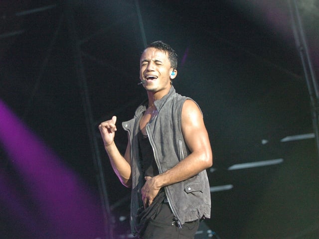 JLS with Aston Merrygold are pictured preforming on the embankment in Peterborough
