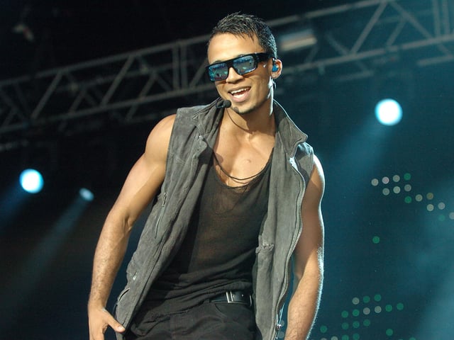 JLS with Aston Merrygold are pictured preforming on the embankment in Peterborough