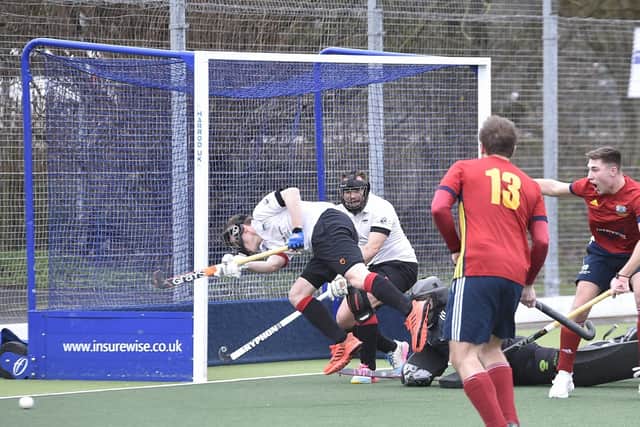 Action from City of Peterborough (red) v Bowdon. Photo: David Lowndes.
