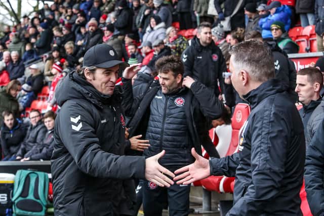Promotion-seeking managers Joey Barton (left) of Fleetwood Town and Darren Ferguson of Posh.