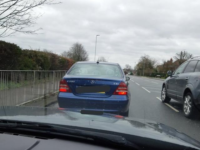The driver was disqualified and there was a warrant for his arrest