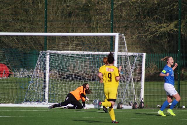Keir Perkins scores for Posh against Rotherham. Photo: Gary Reed
