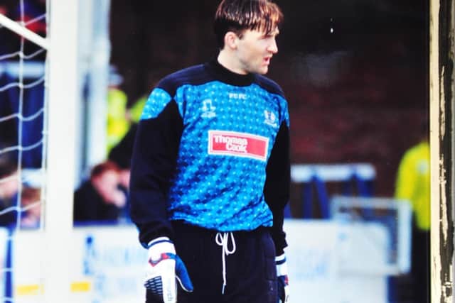 Giant goalkeeper Ian Feuer.