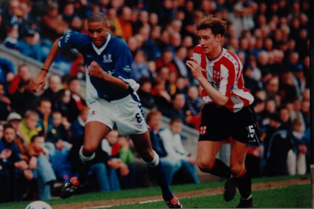 Zat Knight (right) playing for Posh.