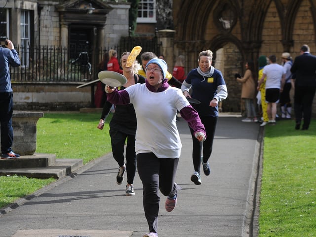The pancake race at Peterborough Cathedral
