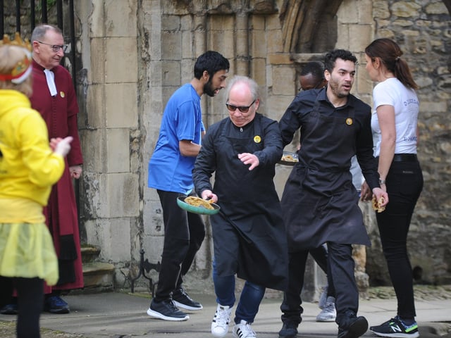 The pancake race at Peterborough Cathedral
