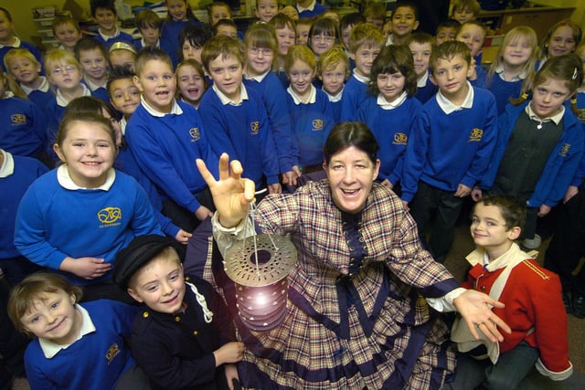 Florence Nightingale (Glynis Hughs) visits Gladstone Road Infants School to give an historical lesson.