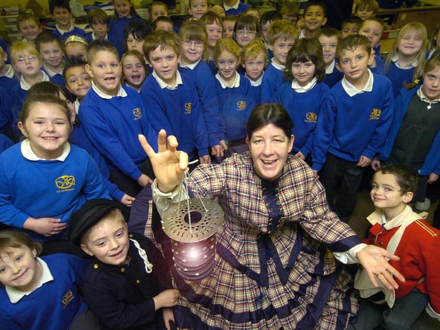 Florence Nightingale (Glynis Hughs) visits Gladstone Road Infants School to give an historical lesson.