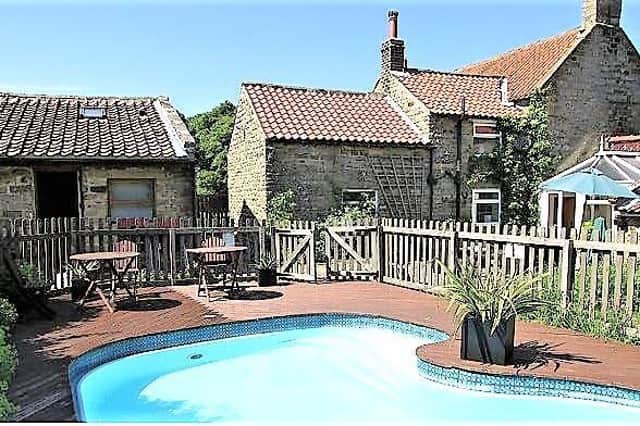 Its own pool and surrounding countryside make for a perfect location.
