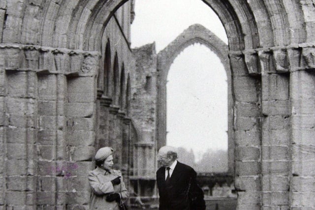 5th April 1985. The Queen visited the ancient ruins of Fountains Abbey, near Ripon. She is seen here with Lord Gibson, former chairman of the national Trust.