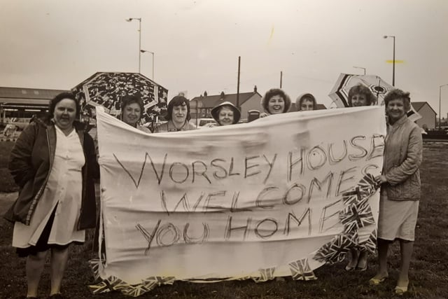 Supporters from Worsley House behind their banner awaiting the Fleetwood team's return