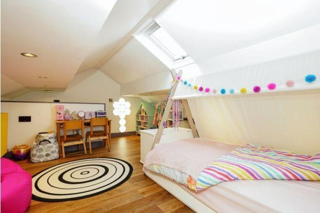 The generous third bedroom is on the recently converted attic space.