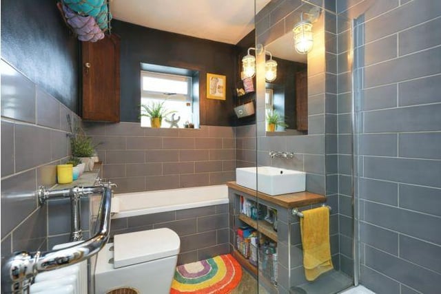 The family bathroom is located on this floor and has a separate bath and standalone shower.