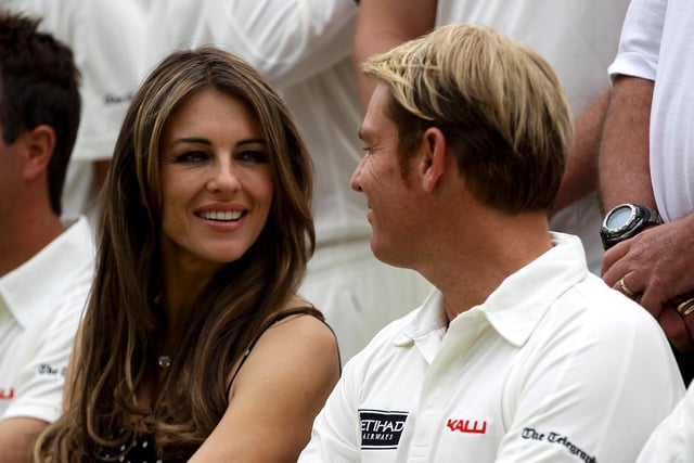 Shane Warne and Elizabeth Hurley were engaged to be married but ultimately parted ways unmarried with both declaring deep affection for one another. Shane Warne and Elizabeth Hurley look on prior to Shane Warne's Australia vs Michael Vaughan's England T20 match at Cirencester Cricket Club on June 09, 2013 in Cirencester, England. (Photo by Ben Hoskins/Getty Images)