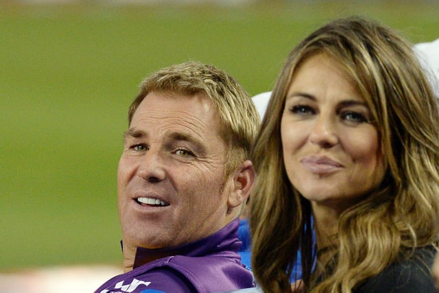 Elizabeth Hurley smiles with Shane Warne the during the final game of a three-match three city US tour of Twenty20 series of Cricket All-Stars Series game against Sachin's Blasters at Dodger Stadium November 14, 2015 in Los Angeles, California. (Photo by Kevork Djansezian/Getty Images)