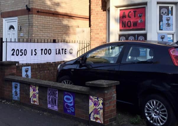 MP Paul Bristow's office was covered in posters by Extinction Rebellion activists