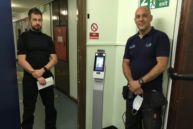 Custody Sergeant Graham Clifton and Chris Christophi of Ace4cctv with the thermal imaging scanner at Peterborough’s Thorpe Wood Police Station.