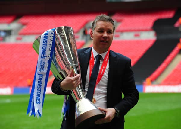Posh manager Darren Ferguson with the Johnstone's Paint Trophy at Wembley.