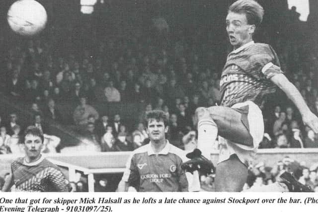 Mick Halsall in action for Posh.