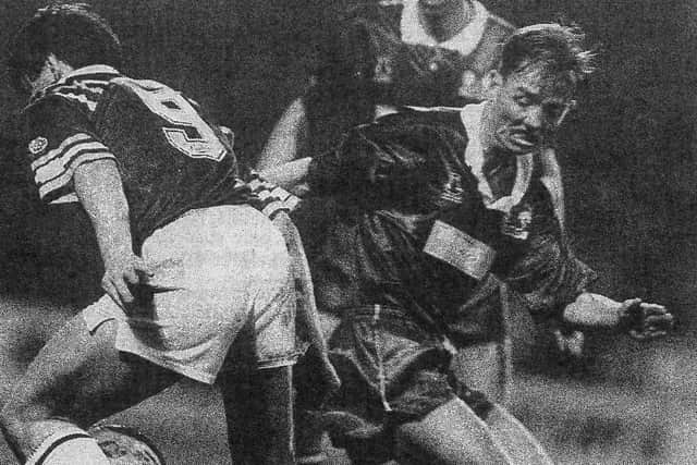 Mick Halsall (right) in action for Posh against West Ham.