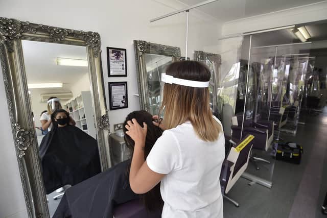 Staff at Serenity Love hair salon at Oundle Road with their Covid PPE equipment. EMN-200107-145025009