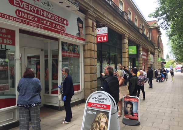Queues at Celly's Salon in Bridge Street this morning