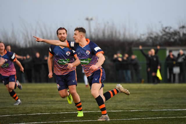 Dan Jarvis celebrates a goal for Yaxley last season. Photo: James Richardson.