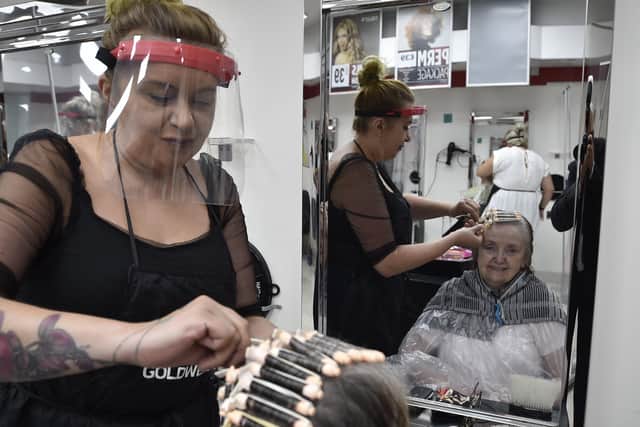 Pearl Capewell, first in the queue (at 7.30am) at Celly's hair salon  in Bridge Street when they re-opened after lockdown. EMN-200407-120758009