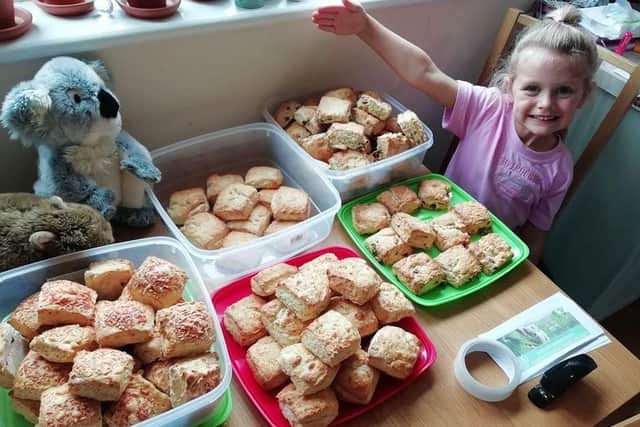 Izzie with some of the scones ready to sell.