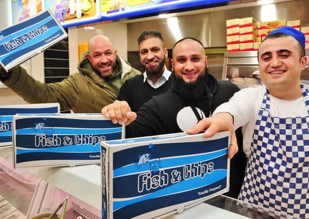 Atiq Rehman (third from left) on a previous charitable venture with the Children of Adam charity pictured with boxing gym owner Vic Imbriano (who paid for 50 meals for the homeless from funds from a boxing show) Waheed Fazal and Ceyhun Dilek from Rumbles fish bar at Werrington