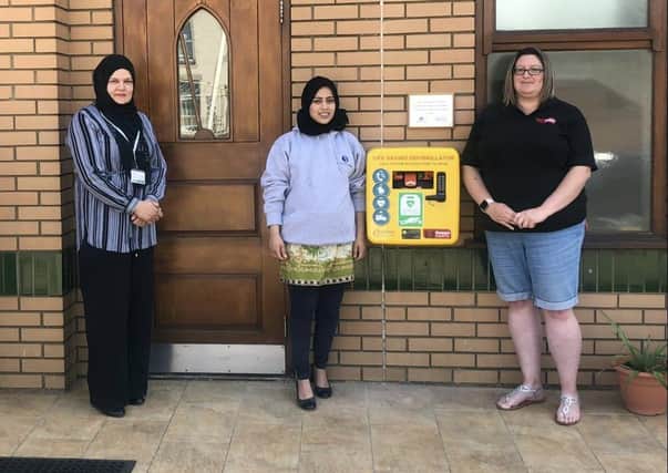 Cllr Shazia Bashir, Dr Almira Haseeb and Gemma Saunders, founder of Gemma's hearts with the new defibrillator.