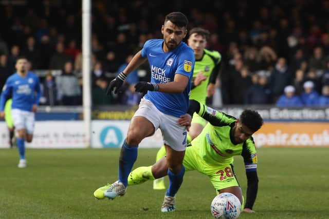 Serhat Tasdemir in action for Posh against Bolton last season.