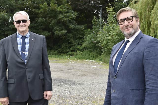 Mayor James Palmer (right) with city council leader John Holdich on the site of the new university