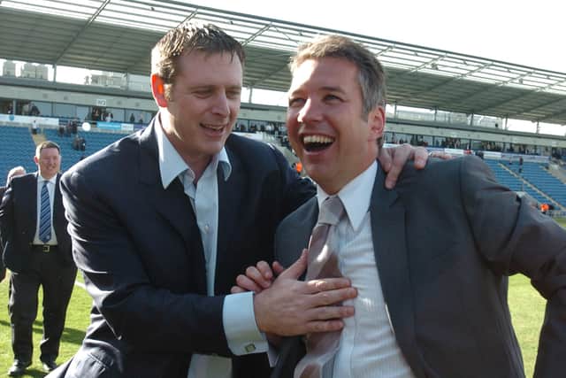 Darren Ferguson and Darragh MacAnthonhy celebrate promotion from League One in April, 2009.