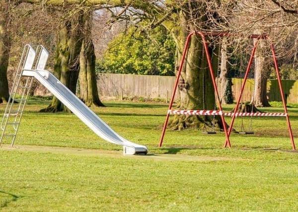 Families are urged not to use swings and slides in council run parks