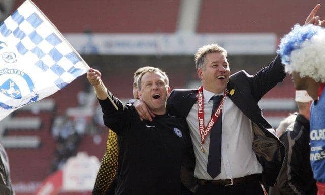 Mark Robson (left) and Darren Ferguson celebrate a Posh promotion at Old Trafford in 2011.