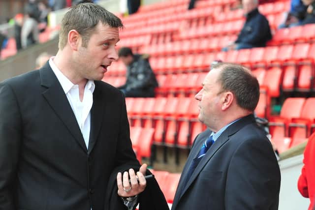 Posh chairman Darragh MacAnthony with manager Gary Johnson in 2011.