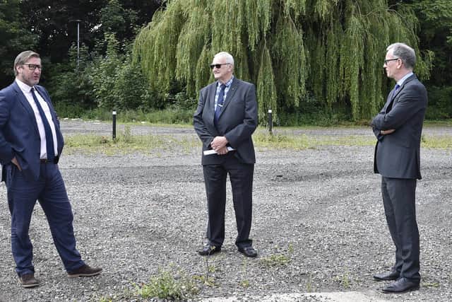 Mayor James Palmer, John Holdich and Professor Roderick Watkins (Vice Chancellor of Anglia Ruskin Peterborough) on the site of the new university on the city's Embankment.