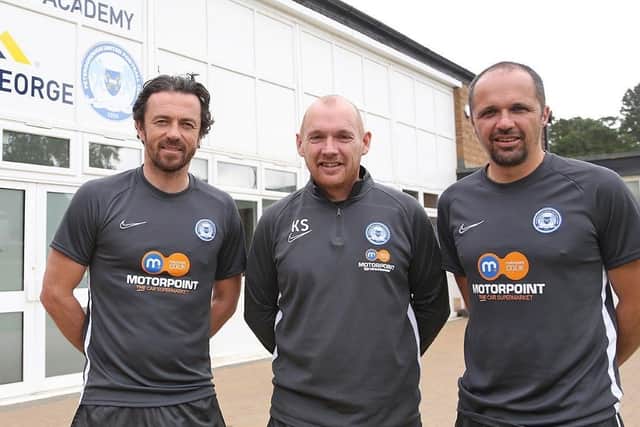 Posh Academy manager Kieran Scarff (centre) with the under 18 management team of Simon Davies (left) and Matthew Etherington (right).
