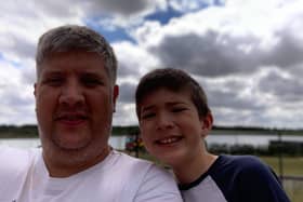 Matthew Kelly with his son.