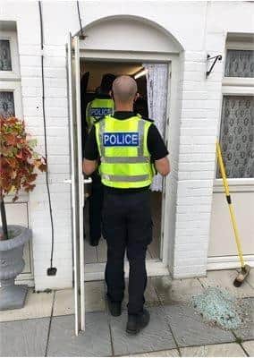 Police carrying out raids in Huntingdon
