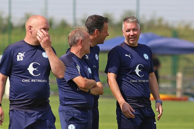 Posh manager Darren Ferguson (right).